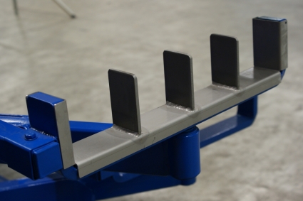 Partitioners for swing-arm racks